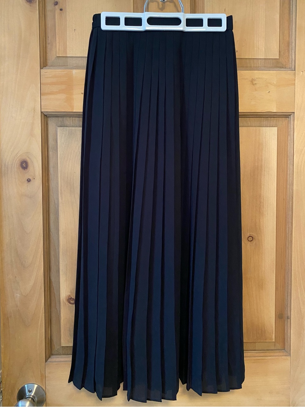 Black pleated midi skirt
